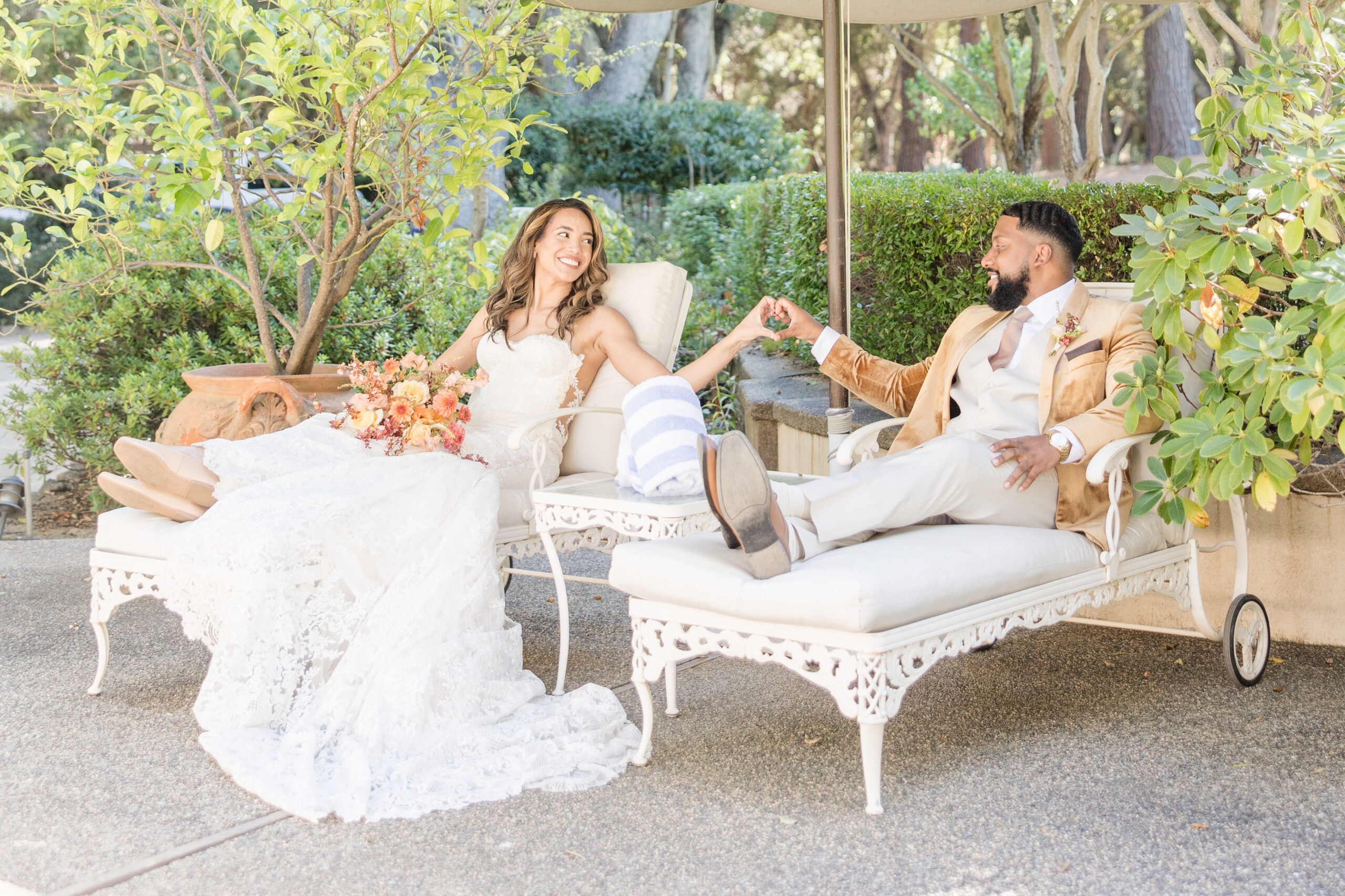 Couple sitting poolside at Stonepine Estates after their ceremony